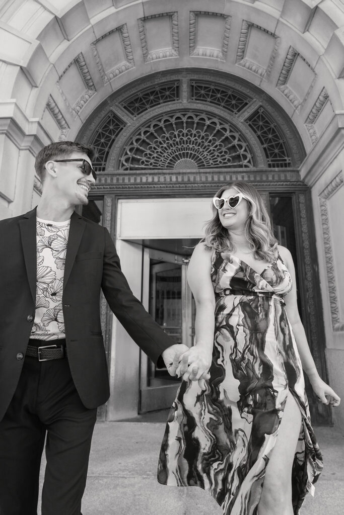 Britt and Tony's downtown engagement session at the Omaha Court House photographed in black and white.