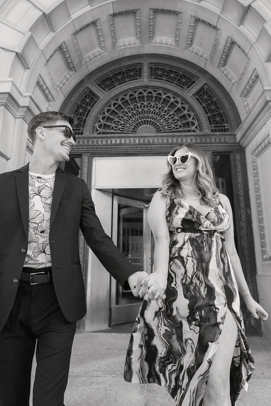 Britt and Tony's downtown engagement session at the Omaha Court House photographed in black and white.