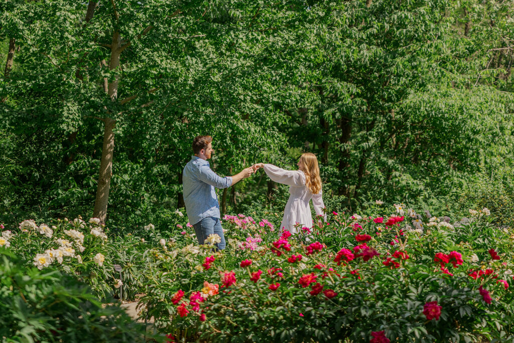 Romantic spring engagement photos at Lauritzen Gardens in Omaha.