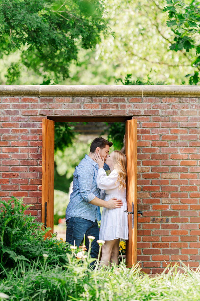 Romantic spring engagement photos at Lauritzen Gardens in Omaha.