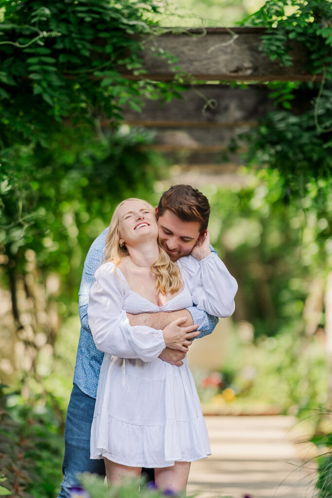 Romantic spring engagement photos at Lauritzen Gardens in Omaha.