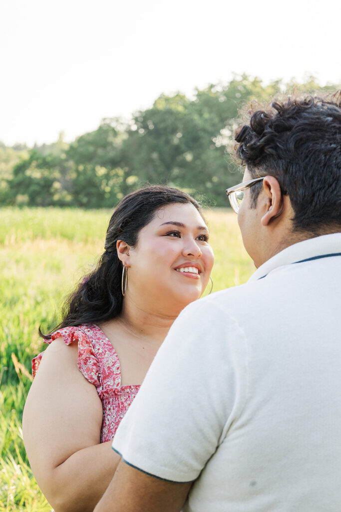 A spring pregnancy photo session at Chalco Hills Recreation area with expecting parents and their pets.