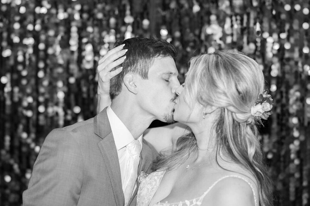 A chic, downtown omaha wedding at Lucile's in the Old Market featuring true color and black and white photography by Claire Katan Creative.