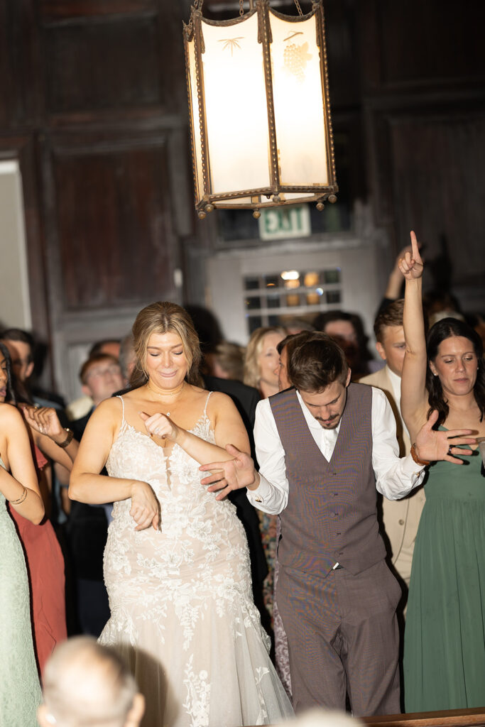 A chic, downtown omaha wedding at Lucile's in the Old Market featuring true color and black and white photography by Claire Katan Creative.