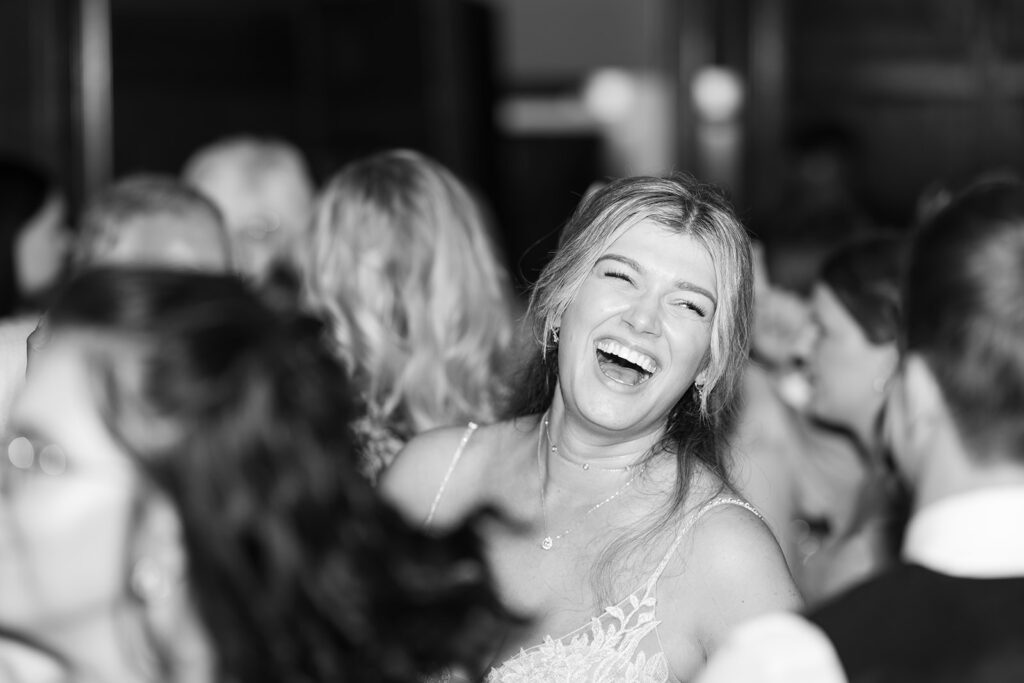 A chic, downtown omaha wedding at Lucile's in the Old Market featuring true color and black and white photography by Claire Katan Creative.