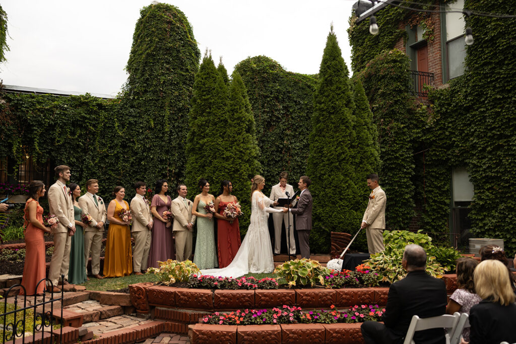 A chic, downtown omaha wedding at Lucile's in the Old Market featuring true color and black and white photography by Claire Katan Creative.