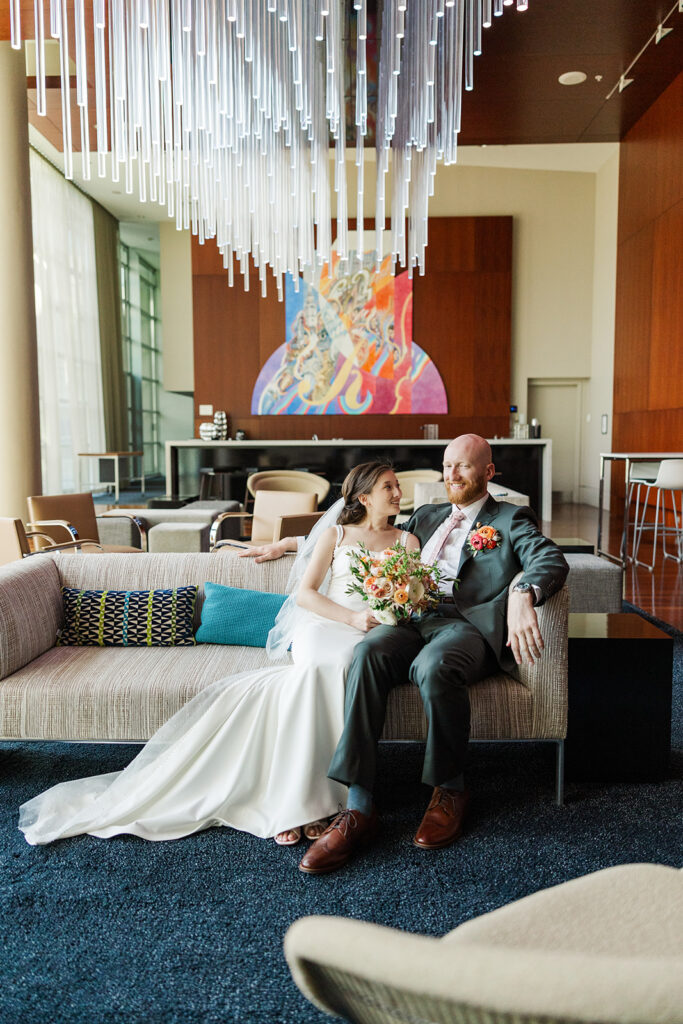 A modern, romantic wedding in downtown Omaha with a ceremony at the Holland Performing Arts Center and a reception at the Leo Ballroom.