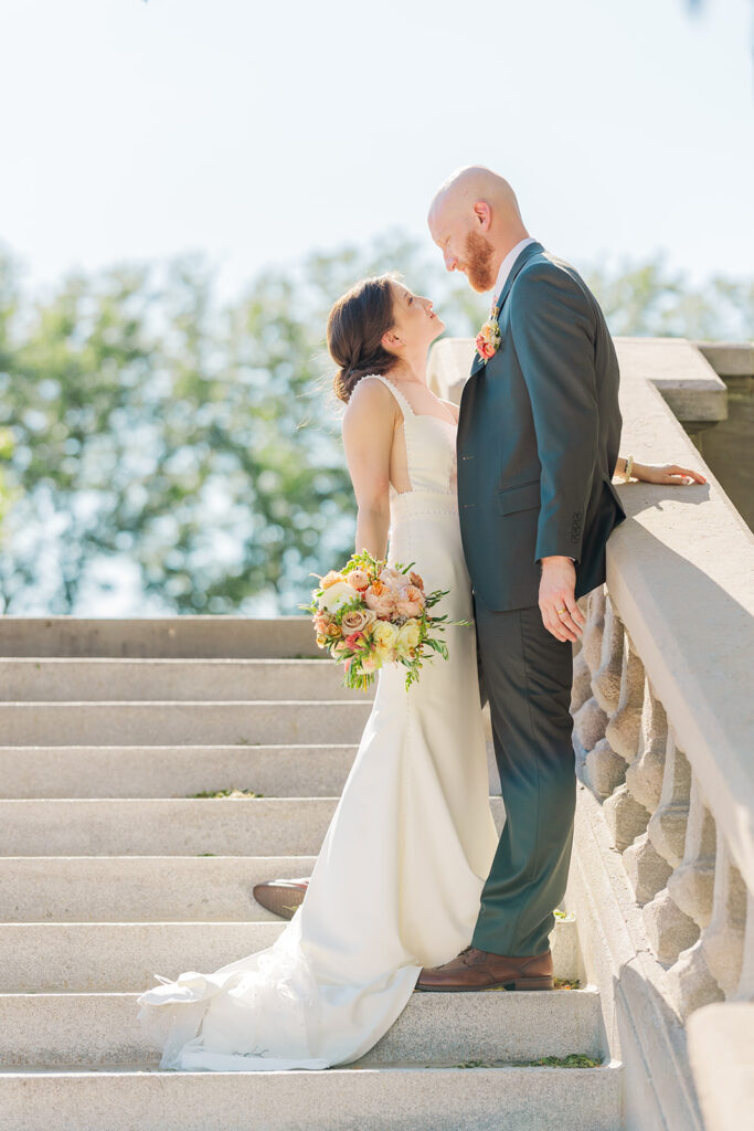 A modern, romantic wedding in downtown Omaha with a ceremony at the Holland Performing Arts Center and a reception at the Leo Ballroom.