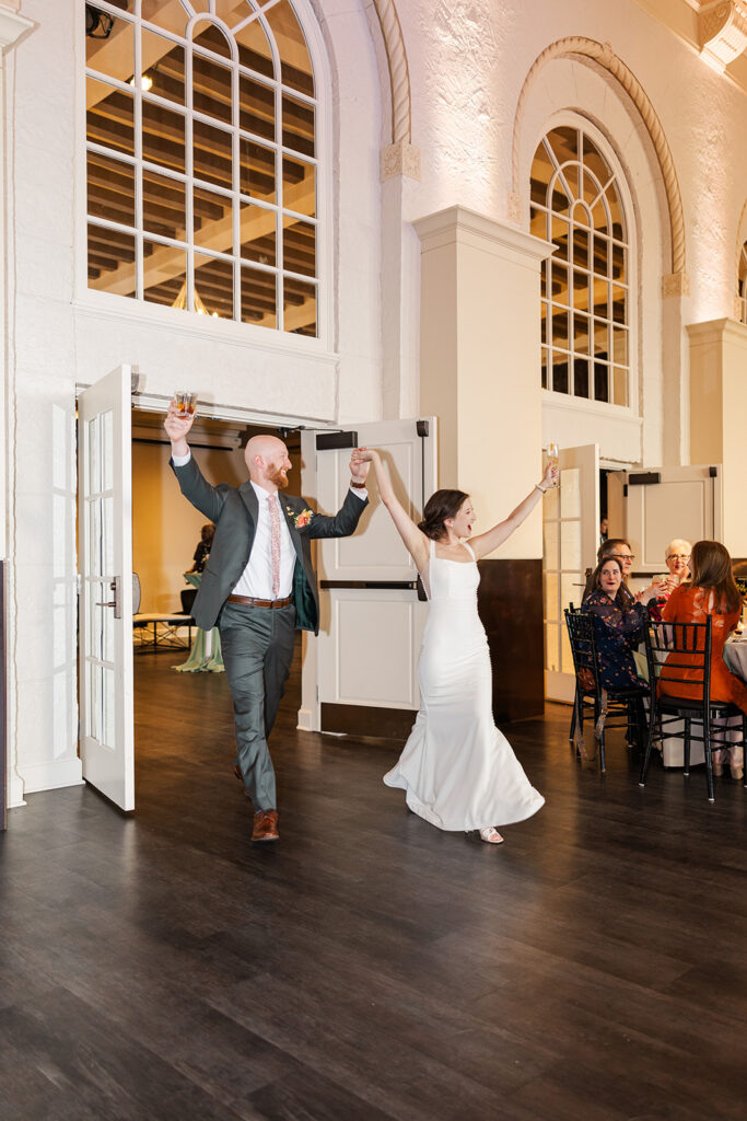 A modern, romantic wedding in downtown Omaha with a ceremony at the Holland Performing Arts Center and a reception at the Leo Ballroom.