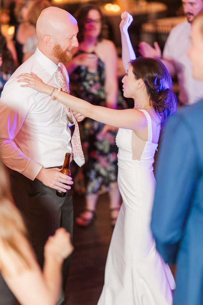 A modern, romantic wedding in downtown Omaha with a ceremony at the Holland Performing Arts Center and a reception at the Leo Ballroom.