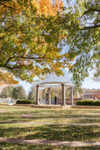 Jay and Evie's Fall Courthouse Wedding Elopement at the Council Bluffs Courthouse with wedding portraits at Omaha's Lauritzen Gardens and Chalco Hills Recreation Area, photographed by Claire Katan Creative.