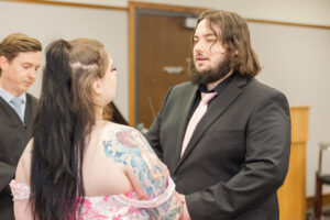 Jay and Evie's Fall Courthouse Wedding Elopement at the Council Bluffs Courthouse with wedding portraits at Omaha's Lauritzen Gardens and Chalco Hills Recreation Area, photographed by Claire Katan Creative.