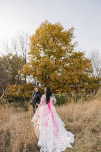 Jay and Evie's Fall Courthouse Wedding Elopement at the Council Bluffs Courthouse with wedding portraits at Omaha's Lauritzen Gardens and Chalco Hills Recreation Area, photographed by Claire Katan Creative.