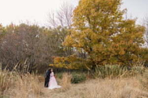 Jay and Evie's Fall Courthouse Wedding Elopement at the Council Bluffs Courthouse with wedding portraits at Omaha's Lauritzen Gardens and Chalco Hills Recreation Area, photographed by Claire Katan Creative.