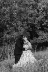 Jay and Evie's Fall Courthouse Wedding Elopement at the Council Bluffs Courthouse with wedding portraits at Omaha's Lauritzen Gardens and Chalco Hills Recreation Area, photographed by Claire Katan Creative.