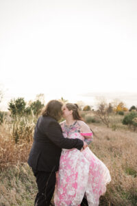 Jay and Evie's Fall Courthouse Wedding Elopement at the Council Bluffs Courthouse with wedding portraits at Omaha's Lauritzen Gardens and Chalco Hills Recreation Area, photographed by Claire Katan Creative.