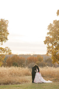 Jay and Evie's Fall Courthouse Wedding Elopement at the Council Bluffs Courthouse with wedding portraits at Omaha's Lauritzen Gardens and Chalco Hills Recreation Area, photographed by Claire Katan Creative.