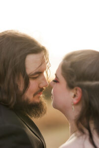 Jay and Evie's Fall Courthouse Wedding Elopement at the Council Bluffs Courthouse with wedding portraits at Omaha's Lauritzen Gardens and Chalco Hills Recreation Area, photographed by Claire Katan Creative.