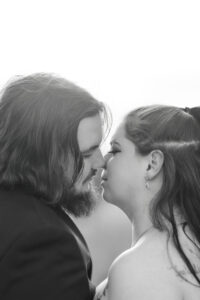 Jay and Evie's Fall Courthouse Wedding Elopement at the Council Bluffs Courthouse with wedding portraits at Omaha's Lauritzen Gardens and Chalco Hills Recreation Area, photographed by Claire Katan Creative.