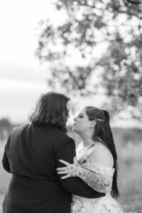 Jay and Evie's Fall Courthouse Wedding Elopement at the Council Bluffs Courthouse with wedding portraits at Omaha's Lauritzen Gardens and Chalco Hills Recreation Area, photographed by Claire Katan Creative.