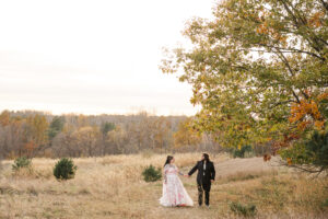 Jay and Evie's Fall Courthouse Wedding Elopement at the Council Bluffs Courthouse with wedding portraits at Omaha's Lauritzen Gardens and Chalco Hills Recreation Area, photographed by Claire Katan Creative.