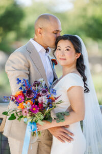 Michelle and Devin's Luxury Wedding at the Omaha Henry Doorly Zoo's Harper Event Center photographed by Claire Katan Creative