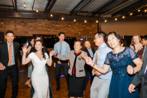 Michelle and Devin's Luxury Wedding at the Omaha Henry Doorly Zoo's Harper Event Center photographed by Claire Katan Creative