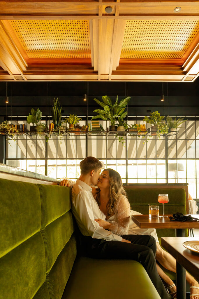 An engagement session at Memoir restaurant in the Omaha Old Market.