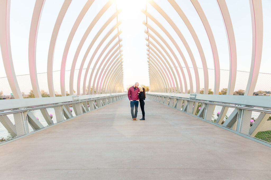 A modern, architectural, downtown Omaha engagement session at the Heartland of America Park by the Old Market and Riverwalk in Omaha.
